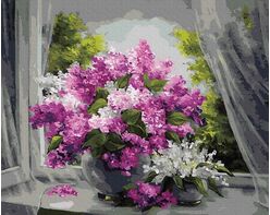 Bouquet of lilacs on the window