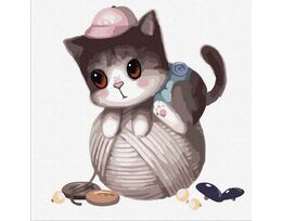 Kitten on a ball of thread